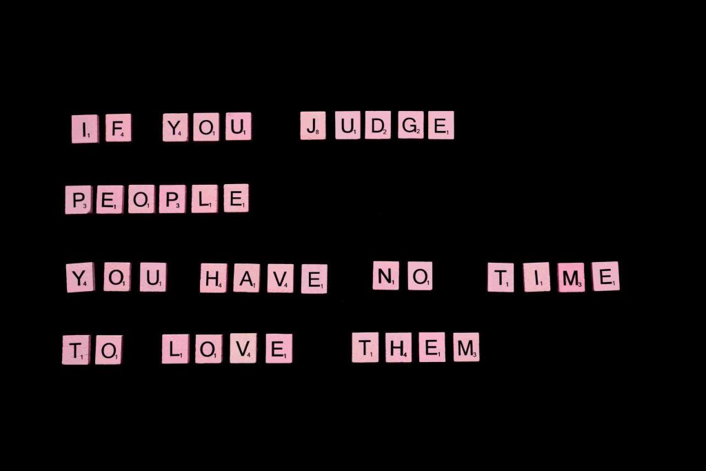 inspirational-quote-spelled-out-with-board-game-letter-tiles-